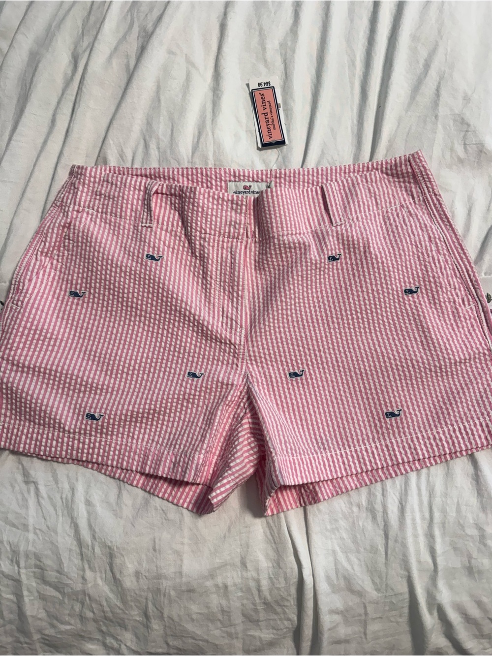 Vineyard Vines shorts feature a pink and white seersucker